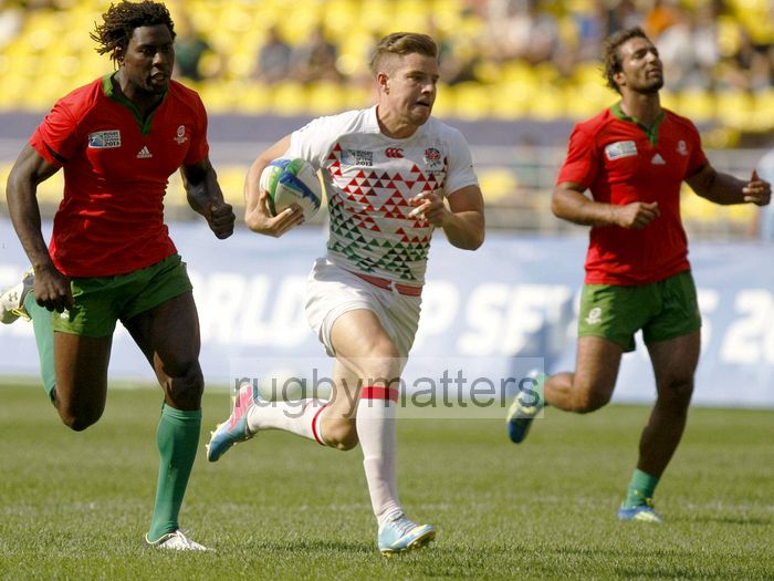 Tom Mitchell races to the line to score a try against Portugal in their first pool match at the IRB RWC 7s at Luzhniki Stadium, Moscow, 28th June 2013