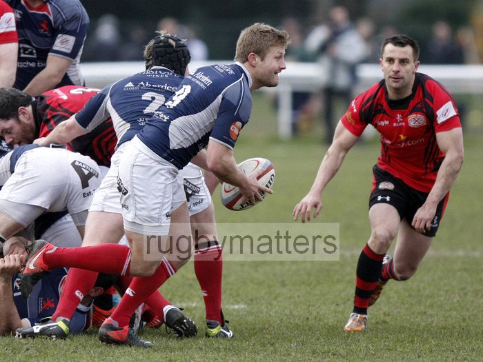 Richard Bolt looks to pass the ball from the back of a ruck. London Scottish v Jersey at Richmond Athletic Ground, Kew Foot Road, Richmond on 2nd March 2013 KO 1400.