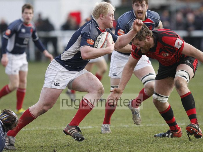 Eric Fry takes on Nathan Hannay. London Scottish v Jersey at Richmond Athletic Ground, Kew Foot Road, Richmond on 2nd March 2013 KO 1400.
