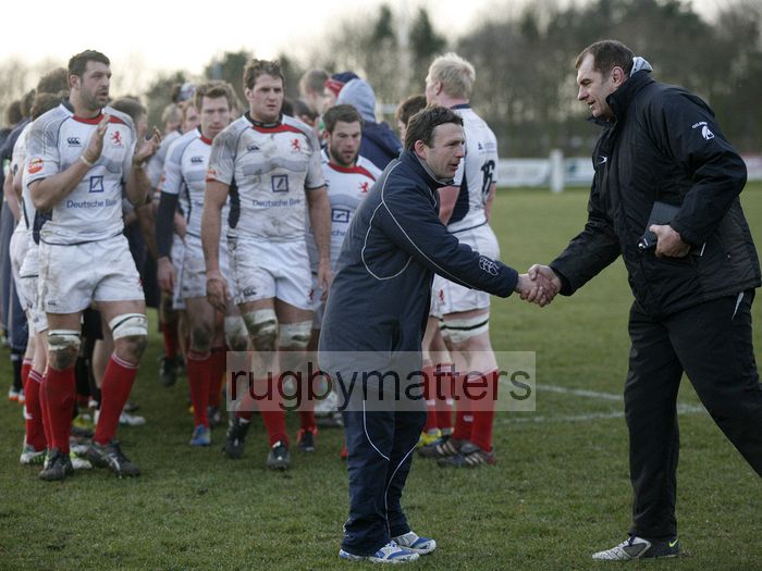 Simon Amor and Dave Baldwin shake hands as London Scottish leave the pitch. Leeds Carnegie v London Scottish at Brantingham Park, Brantingham Road, Brough, East Yorkshire on 10th March 2013 KO 1500.
