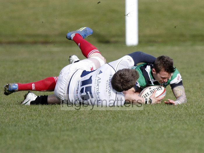 Oli Goss grounds the ball to score a try despite the tackle of Jim Thompson. Leeds Carnegie v London Scottish at Brantingham Park, Brantingham Road, Brough, East Yorkshire on 10th March 2013 KO 1500.
