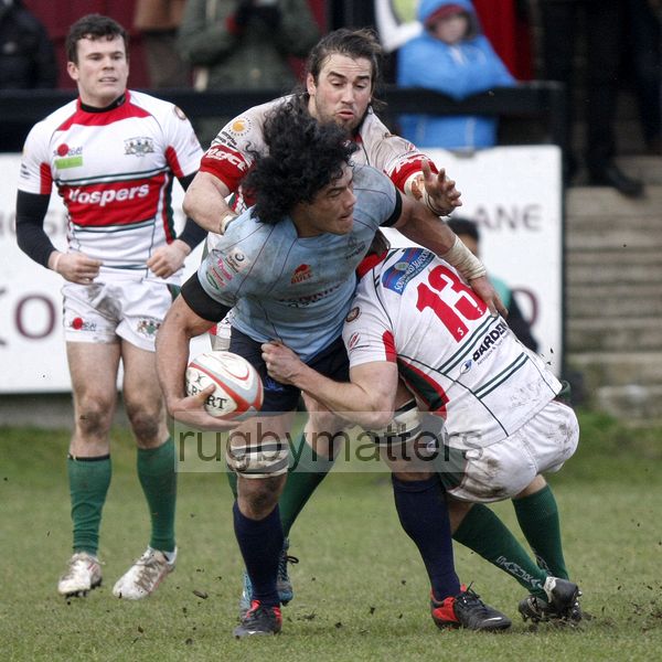 Latu Makaafi looks to offload the ball whilst being tackled by Toby Howley-Berridge and Sean Michael-Stephen. Rotherham Titans v Plymouth Albion at Clifton Lane, Rotherham on 9th February 2013. KO 1430. RFU Championship - Stage 1.