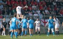Jo McGilchrist passes the ball from the lineout to Natasha Hunt as the travelling English families watch. Italy Women v England Women at Stadio Giulio e Silvio Pagani, Rovato, Italy on 16th March 2014 ko 1500