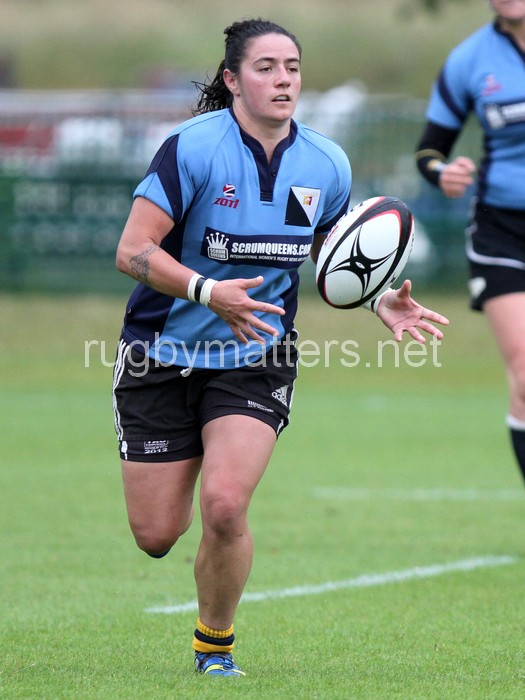 Lisa Campbell passes the ball. Nomads v South Africa, The Lensbury, Broom Road, Teddington, Middlesex, England, on 28th June 2014, ko 2pm.