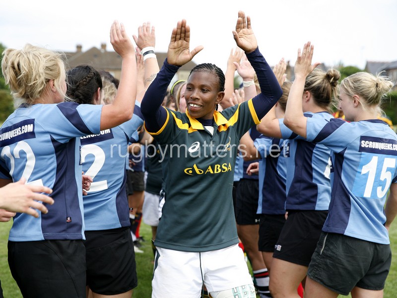 Lamla Momoti high fiving the Nomads in the tunnel. Nomads v South Africa, Twyford Avenue, London, England on 1st July 2014, ko 1400