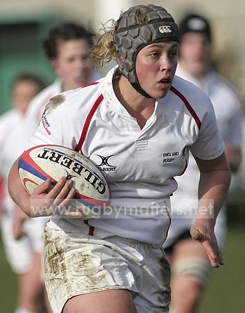England A centre Charlotte Boggis runs in a try for her team
