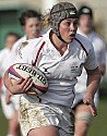 England A centre Charlotte Boggis runs in a try for her team
