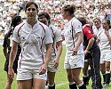Gemma Sharples leads the triumphant Englandteam from the pitch after defeating New Zealand at the London Emirates 7s