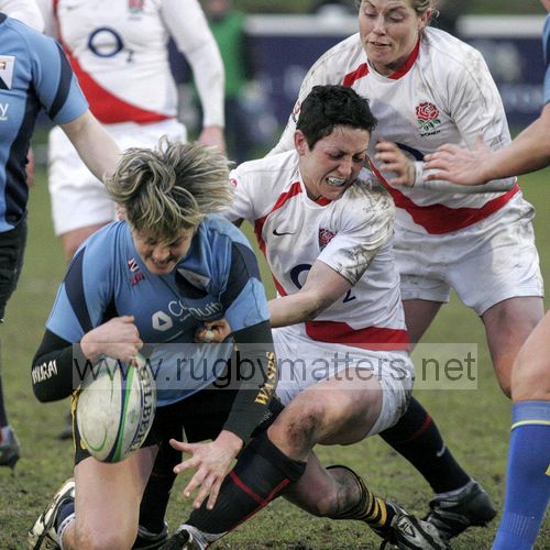 Shelley Rae tackled by Sonia Green