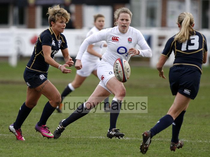 Tanya Griffiths passes the ball to Annabel Sergeant. England Women v Scotland Women at Esher RFC on 2nd February 2013.