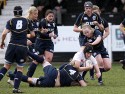Emily Braund tackled by Lindsay Wheeler and Sarah Quick. England Women v Scotland Women at Esher RFC on 2nd February 2013.