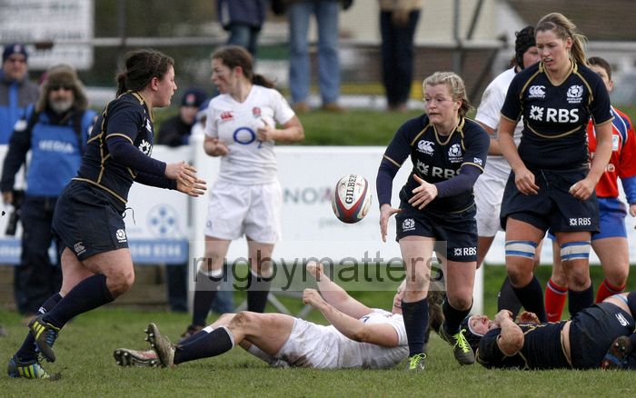 Louise Dalgleish passes the ball from a ruck. England Women v Scotland Women at Esher RFC on 2nd February 2013.