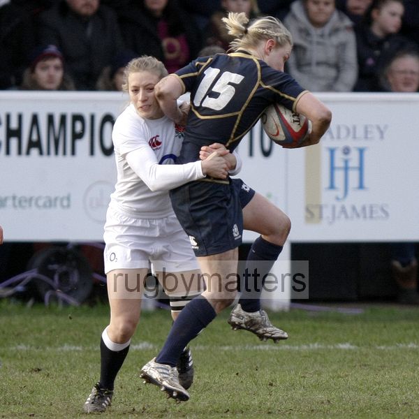 Stephanie Johnston tackled by Fiona Pocock. England Women v Scotland Women at Esher RFC on 2nd February 2013.