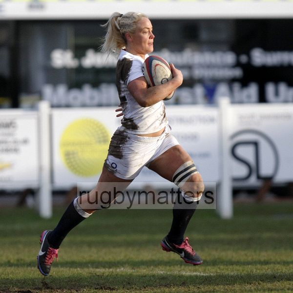 Sally Tuson breaks up the wing and goes on to score a try. England Women v Scotland Women at Esher RFC on 2nd February 2013.