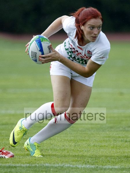 Jo Watmore in action for England in their first pool (D) match against France. IRB RWC 7s at Luzhniki Stadium, Moscow, 29th June 2013