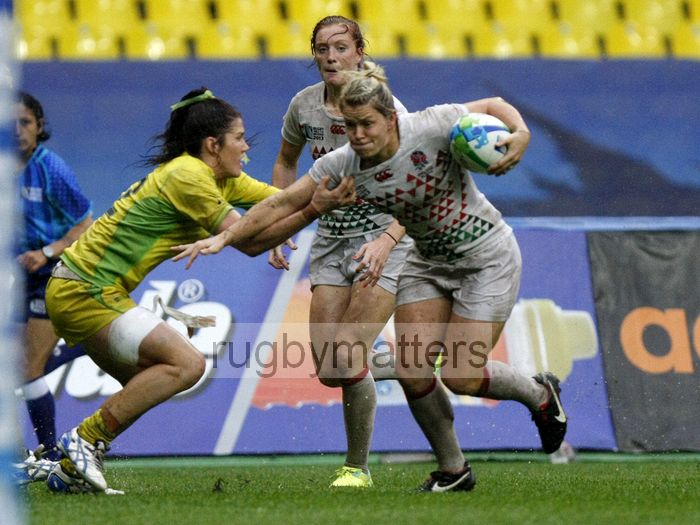 Rachael Burford breaks though to score the only try for England in the Plate Final which they lost to Australia. IRB RWC 7s at Luzhniki Stadium, Moscow, 30th June 2013