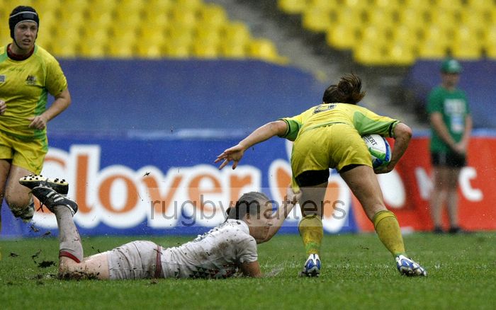 Katy McLean tries to make a tackle with her fingertips as England lose out in the Plate Final to Australia. IRB RWC 7s at Luzhniki Stadium, Moscow, 30th June 2013