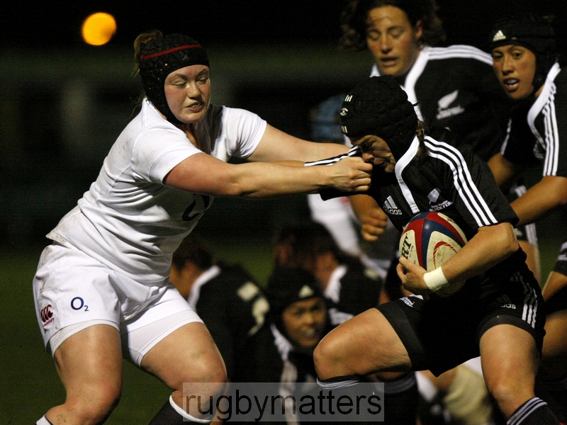 Emma Jensen caught in possession by Laura Keates. England v New Zealand in Autumn International Series at Esher RFC, 23rd November 2012.