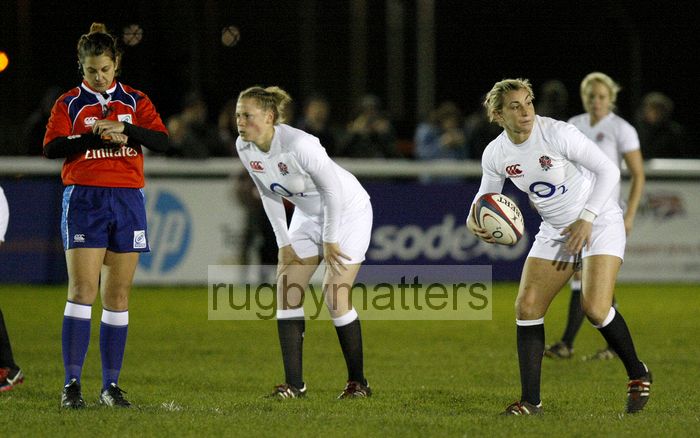 Referee Clare Daniels sets her watch for the start of the match and Alice Richardson prepares to kick off. England v New Zealand in Autumn International Series at Army Rugby Stadium, Aldershot, 27th November 2012.