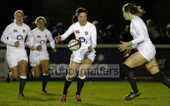 Jo Watmore passes the ball to Emily Scarratt. England v New Zealand in Autumn International Series at Army Rugby Stadium, Aldershot, 27th November 2012.