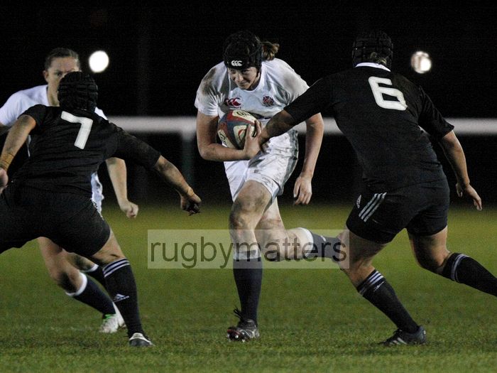 Emily Braund takes the ball into contact. England v New Zealand in Autumn International Series at Army Rugby Stadium, Aldershot, 27th November 2012.