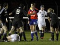 Referee Clare Daniels produces a yellow card to Katy McLean,  whilst she lies on the pitch bleeding. England v New Zealand in Autumn International Series at Army Rugby Stadium, Aldershot, 27th November 2012.