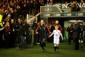 Captain Katy McLean leads the team out with mascot. England v New Zealand in Autumn International Series at Twickenham, England on 1st December 2012.