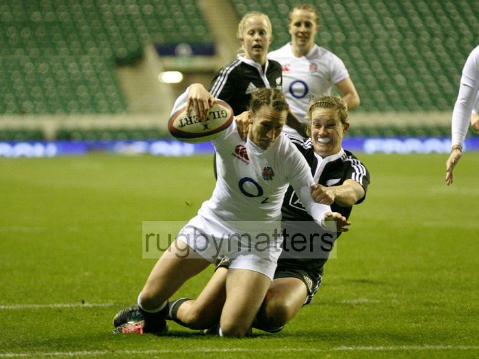 Kat Merchant goes over the line to score a try. England v New Zealand in Autumn International Series at Twickenham, England on 1st December 2012.