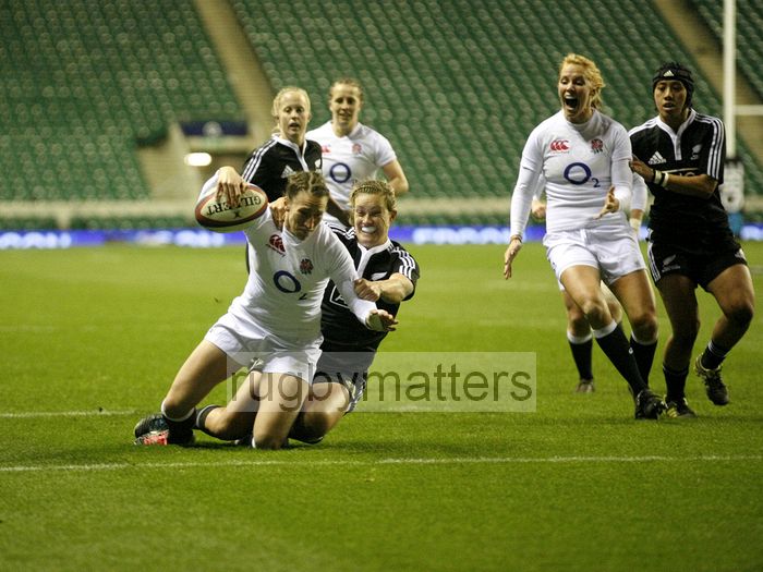 Kat Merchant about to ground the ball for a try. England v New Zealand in Autumn International Series at Twickenham, England on 1st December 2012.