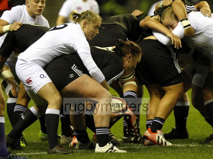 Natasha Hunt once again making herself a nuisance to Casey Robertson off the back of the scrum. England v New Zealand in Autumn International Series at Twickenham, England on 1st December 2012.