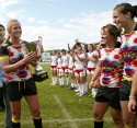 Michaela Staniford takes the trophy back to her team after winning the Cup Final. FIRA-AER Womens Grand Prix 7s at Stadium Municipal,  Brive, 2nd June 2013.