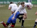 Holly Molesworth tackled by Camille Imart. U20 England Women v U20 France Women at Esher RFC, Molesey Road, Hersham, Surrey. 23rd February 2013, KO 1400.
