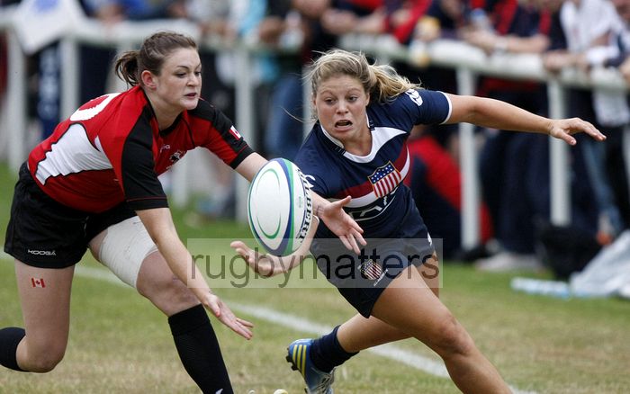 Hannah Darling and Natalie Kosko chase loose ball. Canada v USA in the U20's Nations Cup Final, Trent College, Derby Road, Long Eaton, Nottingham, 21st July 2013, kick off 1700.