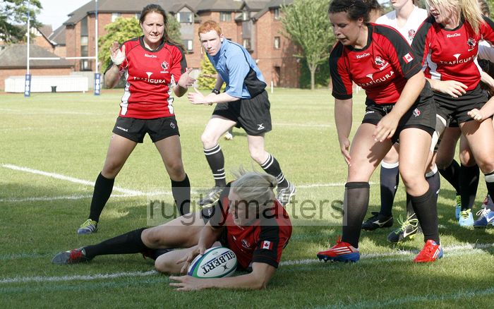 Daria Keane grounds the ball to score a try. England v Canada in the U20's Nations Cup, Trent College, Derby Road, Long Eaton, Nottingham, 14th July 2013, kick off 1700.