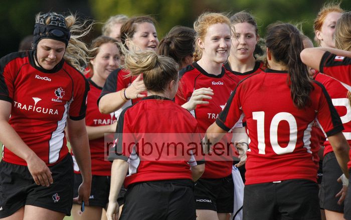 Canada players very celebrate winning 15-43 against England. England v Canada in the U20's Nations Cup, Trent College, Derby Road, Long Eaton, Nottingham, 14th July 2013, kick off 1700.