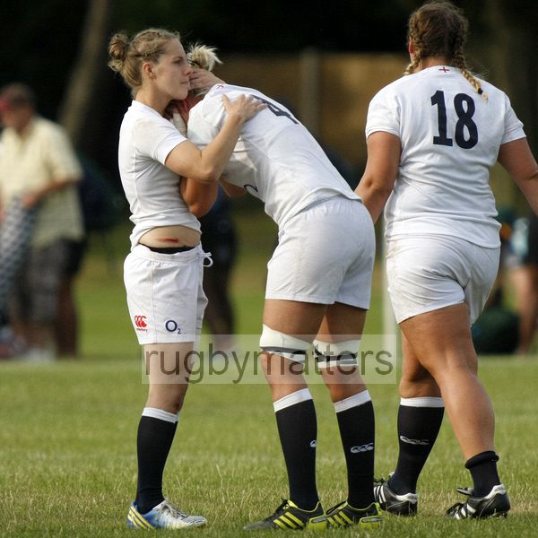 Kayleigh Callaway-Bawden comforts Courtney Gill after the disappointment of missing out to Canada 15-43. England v Canada in the U20's Nations Cup, Trent College, Derby Road, Long Eaton, Nottingham, 14th July 2013, kick off 1700.
