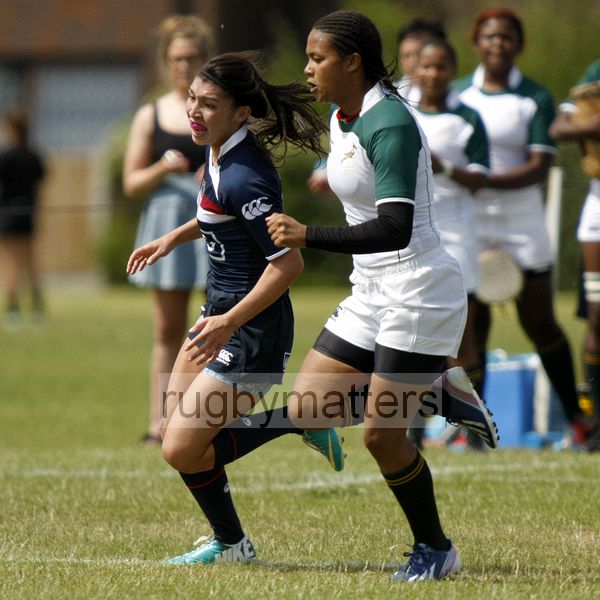 Stephanie Brown and Gabby Fisher chase a loose ball. South Africa v USA in the U20's Nations Cup, Trent College, Derby Road, Long Eaton, Nottingham, 14th July 2013, kick off 1400.