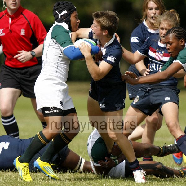 Cassidy Meyers and Annique Geswind wrestle for the ball. South Africa v USA in the U20's Nations Cup, Trent College, Derby Road, Long Eaton, Nottingham, 14th July 2013, kick off 1400.