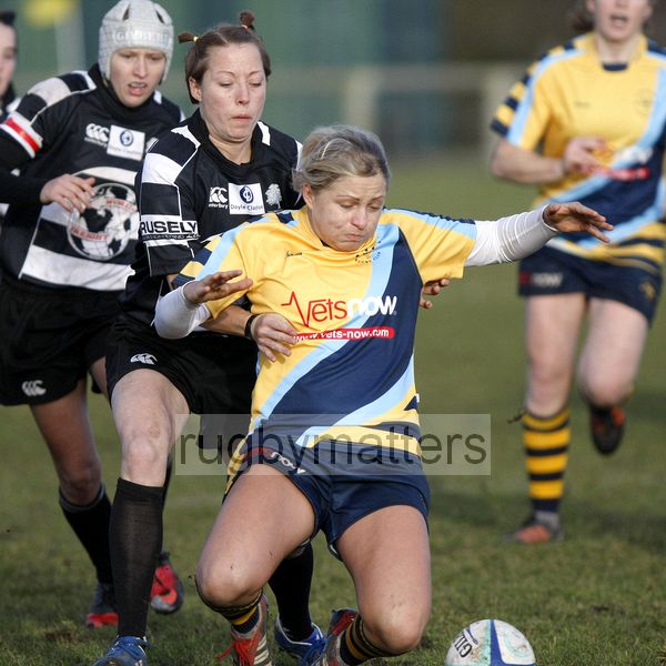 Ceri Large and Claire Brickley-Moore compete for a loose ball.  Worcester v Thurrock T-Birds at Sixways, Worcester on 16th December 2012.