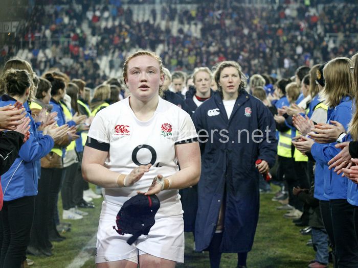 Laura Keates, Rochelle Clarke and team leave the pitch as England lose. France Women v England Women in the Six Nations 2014 at Stade des Alpes, Grenoble, France on Saturday 1st February 2014, kick off 2055