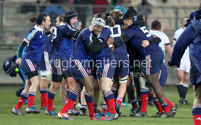Sandrine Agricole and rest of the French team celebrate victory. France Women v England Women in the Six Nations 2014 at Stade des Alpes, Grenoble, France on Saturday 1st February 2014, kick off 2055