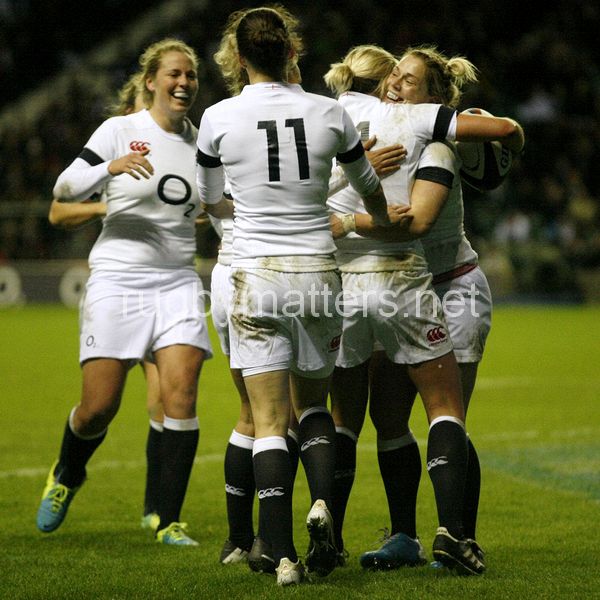 Rachael Burford and others celebrate with Claire Allan on her scoring a try. England Women v France Women at Twickenham Stadium, Twickenham, England on 9th November 2013 ko 1705