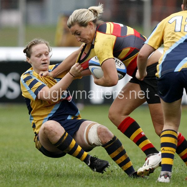 Alice Richardson tackled by Jenny Mills. Richmond v Worcester at The Athletic Ground, Twickenham Road, Richmond on 15th September 2013, KO 1500. Richmond 26-12 Worcester.