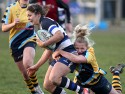 Amy Wilson-Hardy tackled by Lauren Chenoweth. Worcester v Bristol at Sixways, Worcester on 8th December 2013, ko 1400