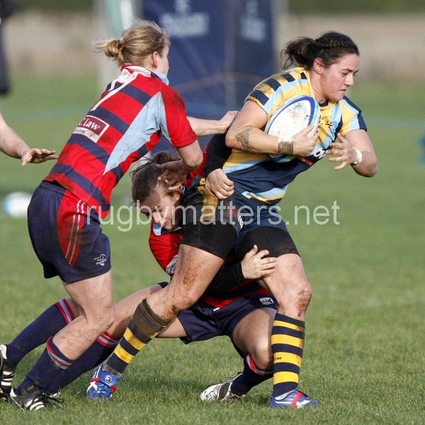 Lisa Campbell is tackled by Fiona Davidson. Worcester v DMP Sharks at Westons Land Pitches, Sixways, Pershore Lane, Worcester on 27th October 2013 ko 1400