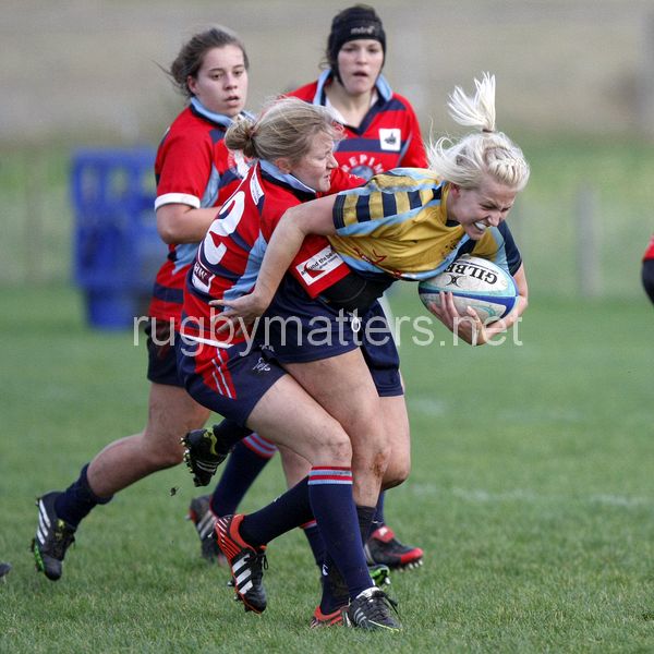 Courtney Gill tackled by Georgina Roberts. Worcester v DMP Sharks at Westons Land Pitches, Sixways, Pershore Lane, Worcester on 27th October 2013 ko 1400