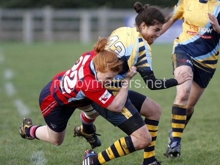 Sophie Watkiss tackled by Juliet Short. Worcester v DMP Sharks at Westons Land Pitches, Sixways, Pershore Lane, Worcester on 27th October 2013 ko 1400