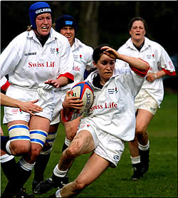 Jo Yapp of Worcester, with Teresa Andrews at her shoulder, starts another England attack!
